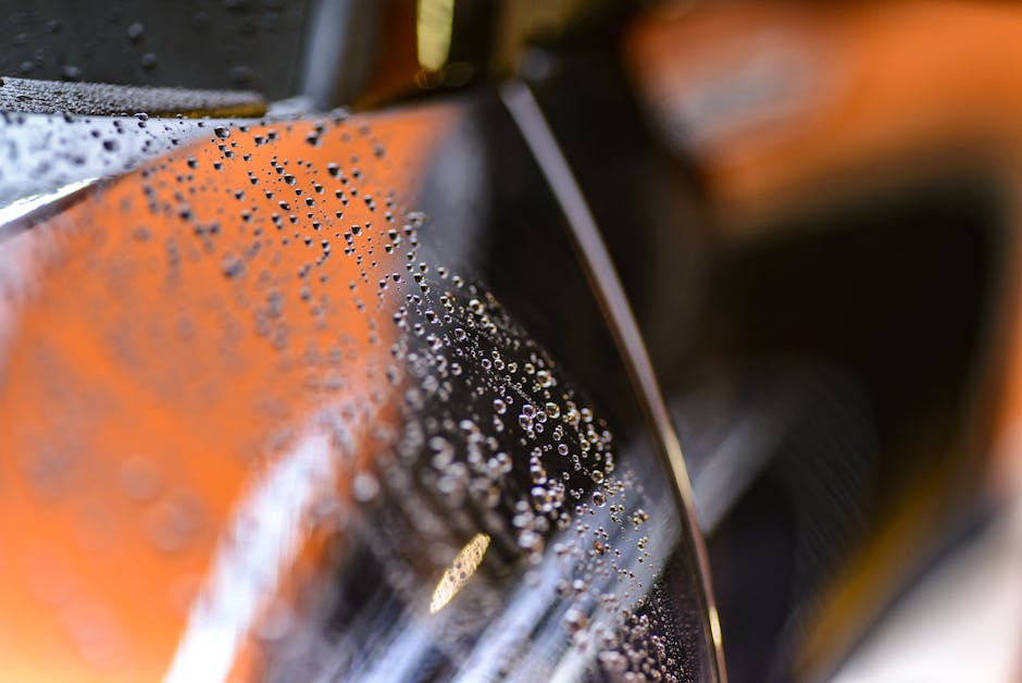 Water drops beading on car paint