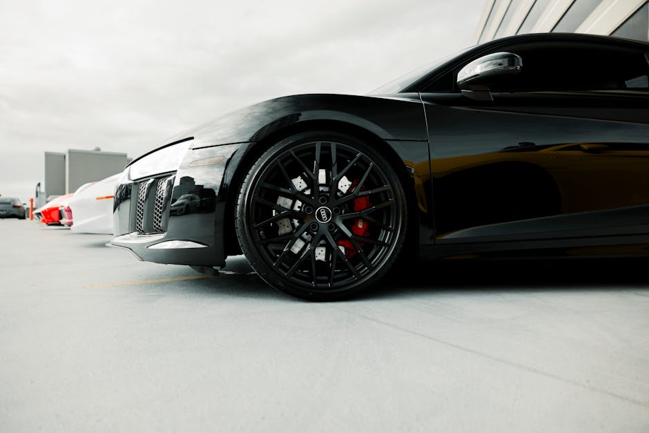 Glossy black sports car
